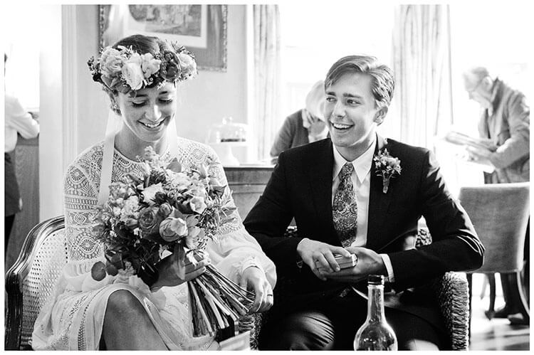 bride and brother laughing before ceremony