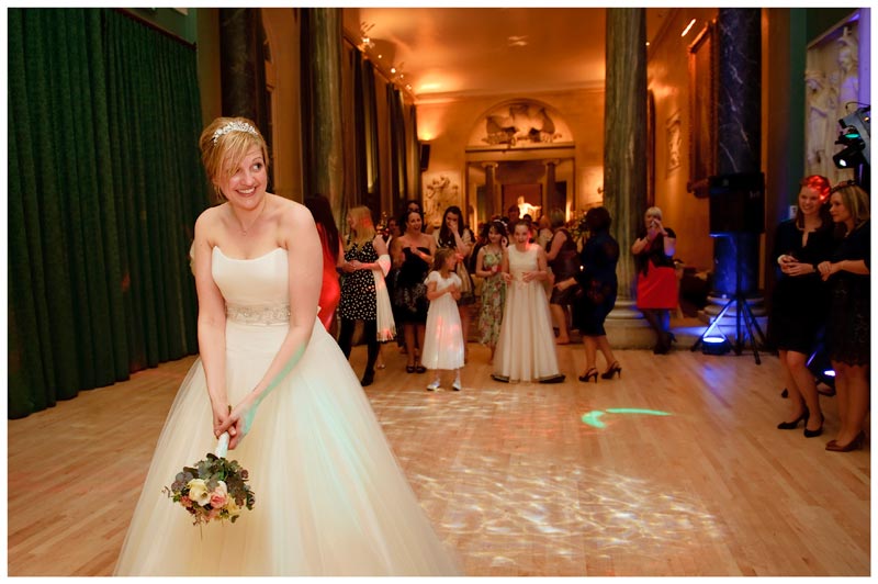bride ready to throw bouquet at Woburn Sculpture Gallery wedding