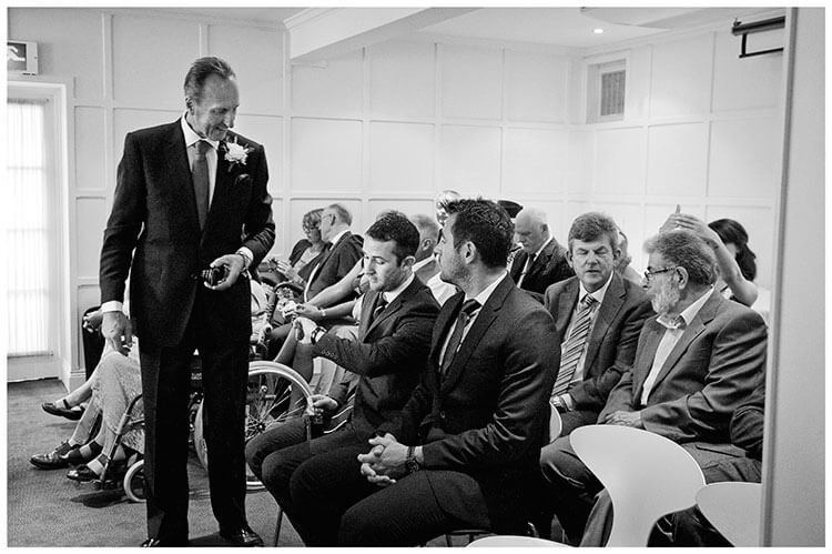 groom checks time Old Bridge Hotel Huntingdon wedding