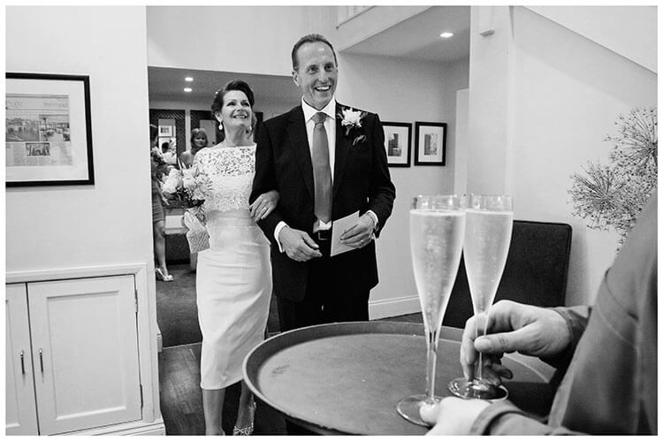 Old Bridge Hotel Huntingdon bride groom accept champagne