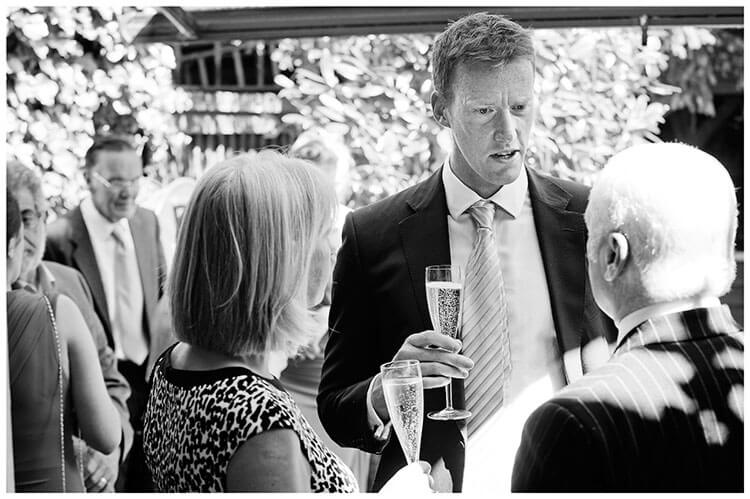 Old Bridge Hotel Huntingdon wedding guests drinking