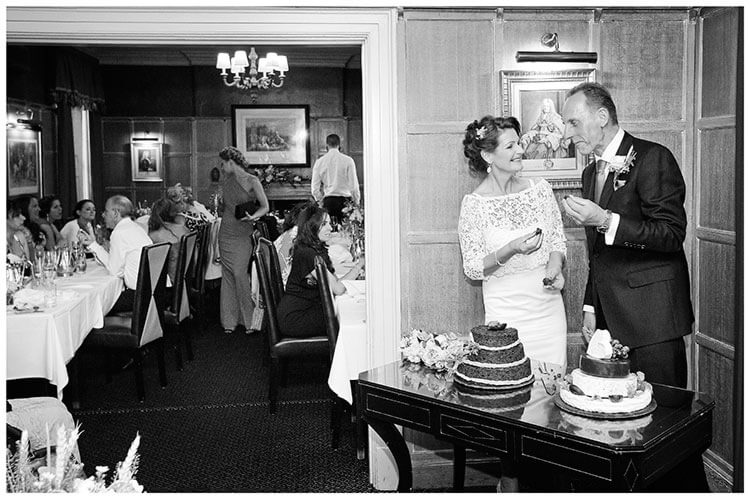 Old Bridge Hotel Huntingdon wedding bride groom tasting cake