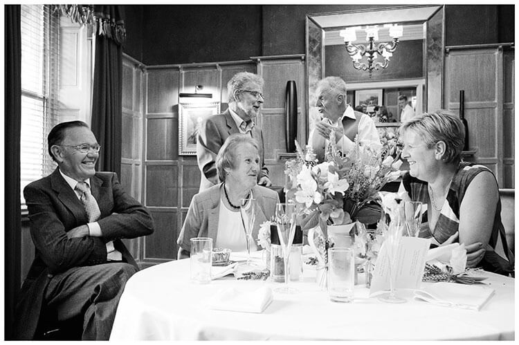 Old Bridge Hotel Huntingdon wedding guests at table talking