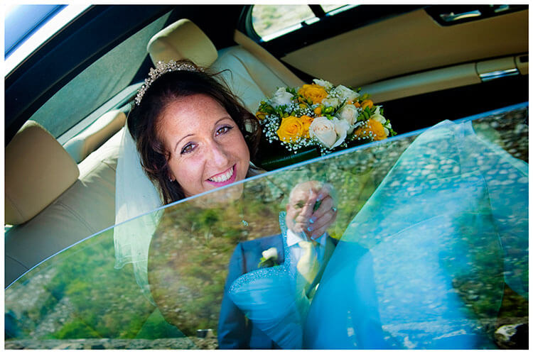 lake garda wedding photography bride in car her father reflected in window