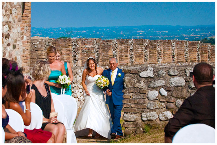 lake garda wedding photography bride arrives for ceremony greeted by guests