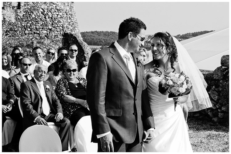 lake garda wedding photography bride groom share a glance during ceremony