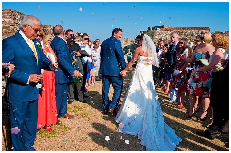 lake garda wedding photography confetti under blue sky
