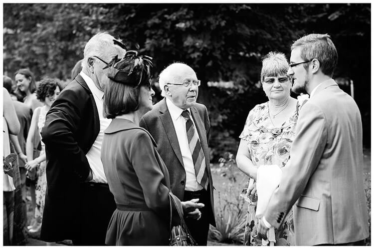 Michaelhouse wedding groom talking to guests