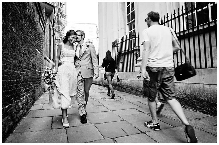 Michaelhouse wedding bride groom share moment on streets of Cambridge