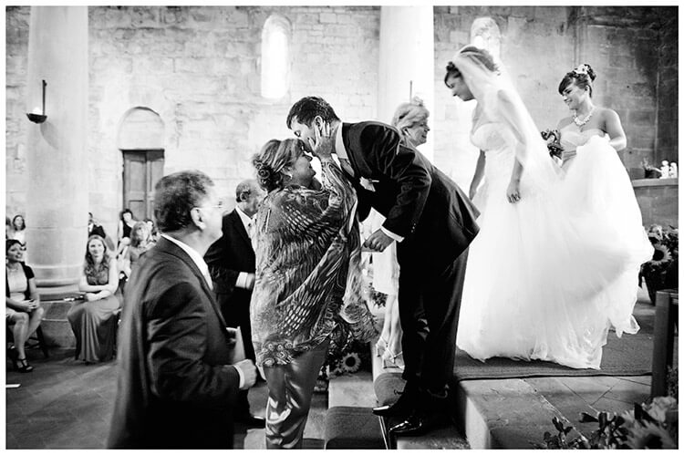 Fraternita di Romena wedding groom kisses mothers forehead