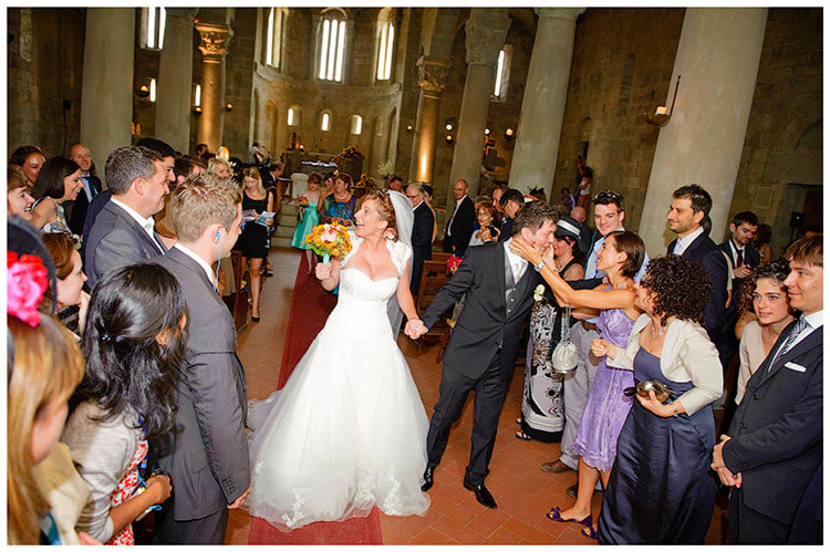 Fraternita di Romena wedding bride groom walking down aisle congratulations