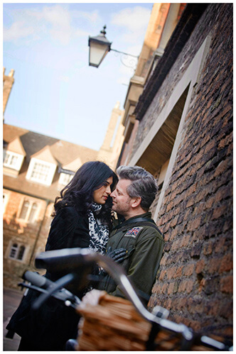 pre-wedding photography Cambridge leaning against wall lamp bicycle