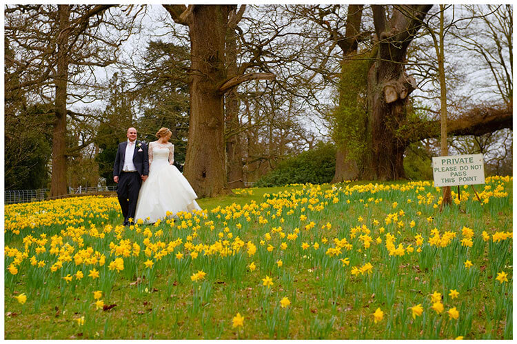 Woburn Sculpture Gallery wedding bride groom walking in daffodils please do not enter sign