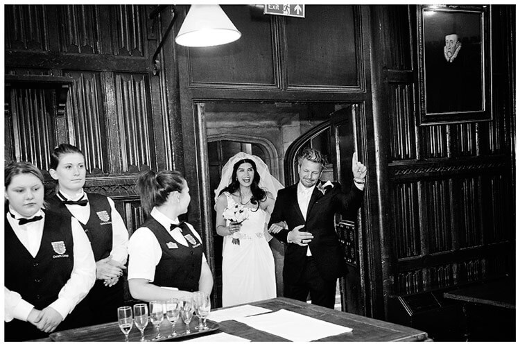 Christ’s College wedding happy bride groom enter dining room