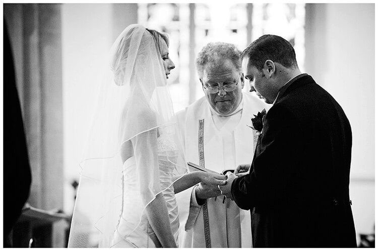 Wedding Photography at Tattersalls bride groom exchange rings