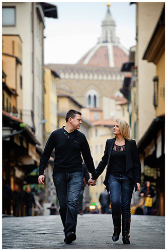 Pre-Wedding Photography in Florence couple holding hands walking the streets of florence