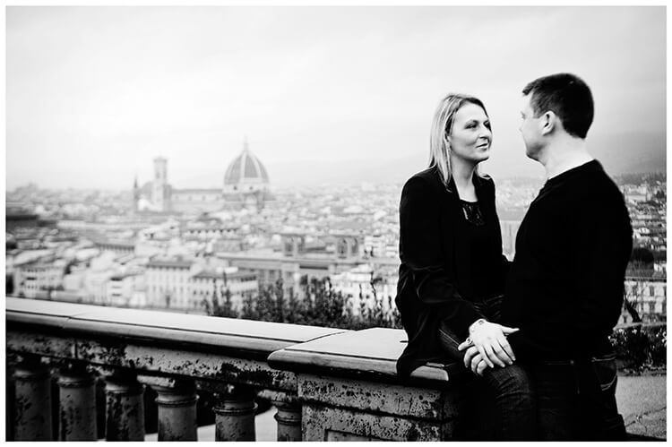 Pre-Wedding Photography in Florence couple share a moment with Duomo and the city behind