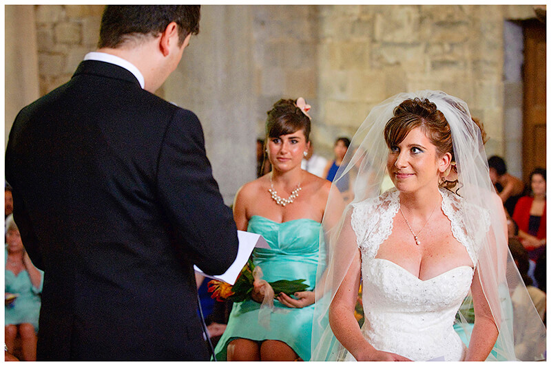 Fraternita di Romena Tuscany  groom gives a reading to bride