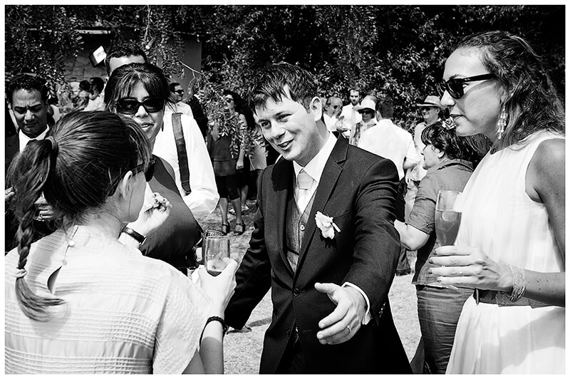 groom about to hug guest