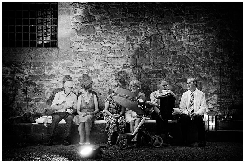 Castel di Poggio Tuscany Wedding venue older guests enjoying a sit down under the night sky
