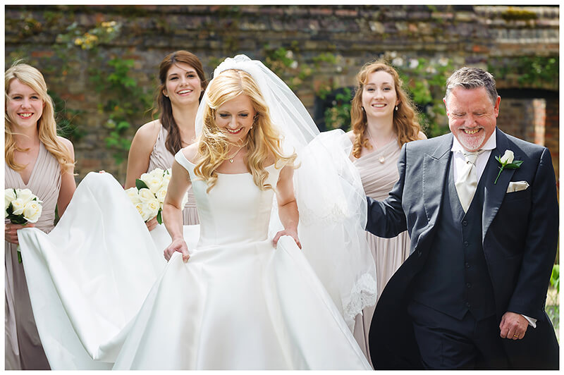 Smiling Bridal Party on way to the chapel 