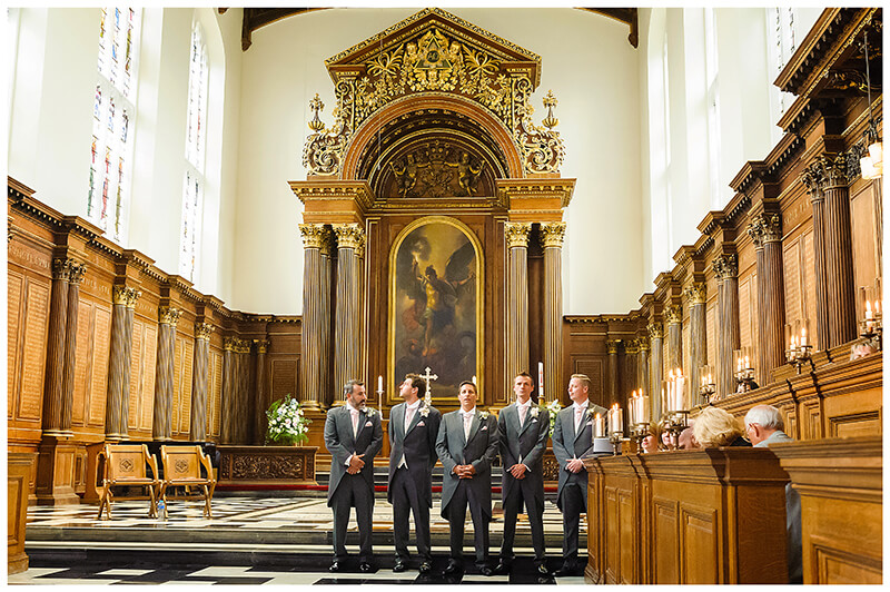 groom and his Groomsmen at alter waiting for bride at trinity College Chapel Alter