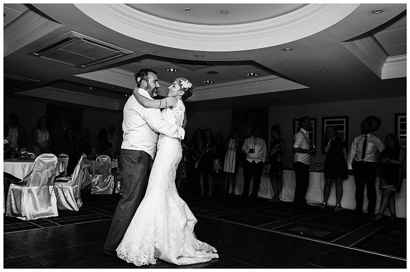 bride and groom first dance embrace