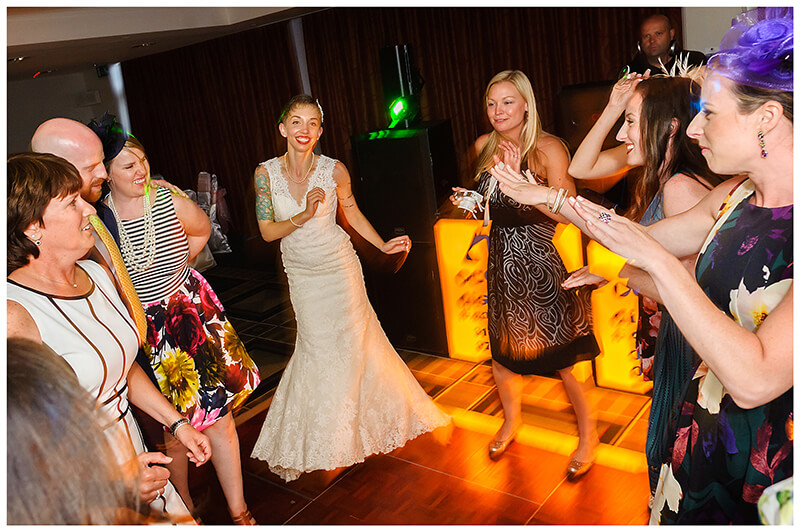 bride with friends on dance floor