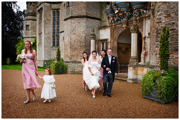 hengrave hall wedding bride makes her way to church