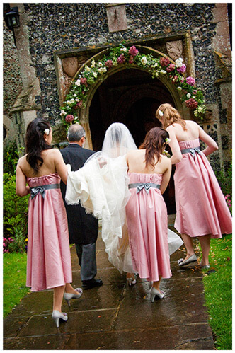 hengrave hall wedding bridal party about to enter church