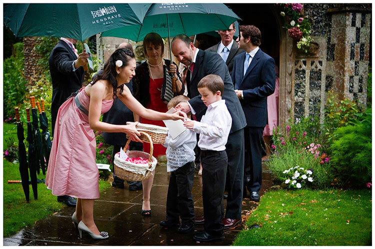 hengrave hall wedding handing out confetti