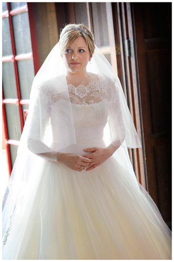 bride waits for the time to walk down aisle