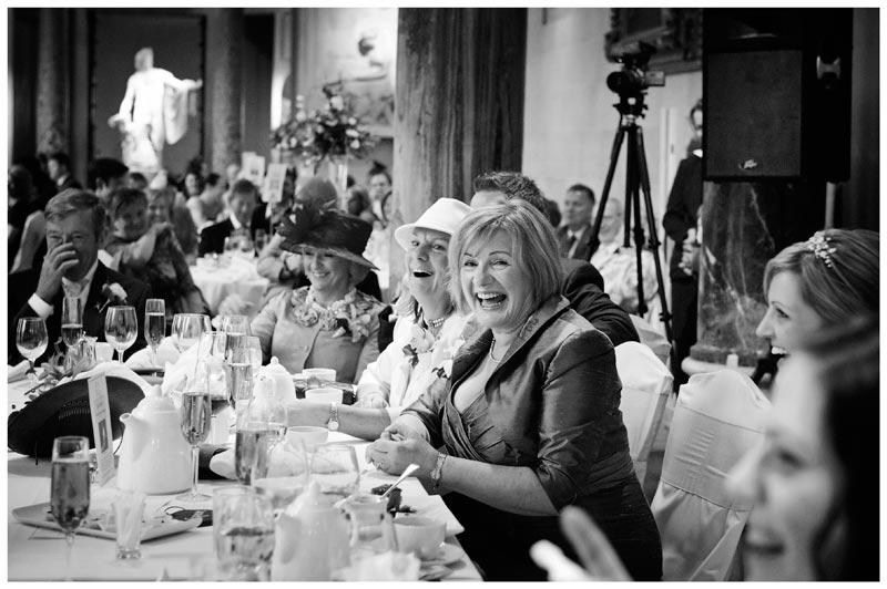 laughter during wedding speeches at Woburn Sculpture Gallery