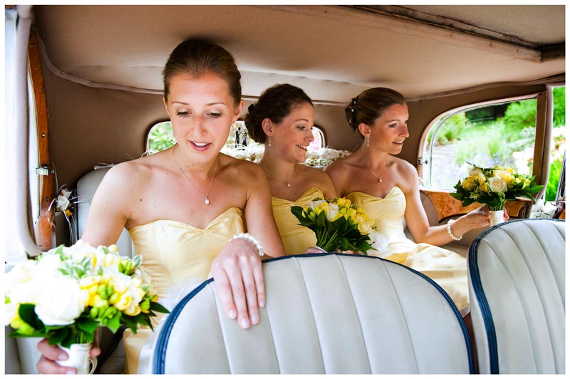 bridesmaids in car