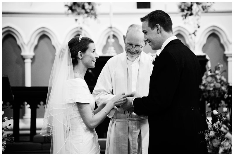 smiling bride groom exchange vows