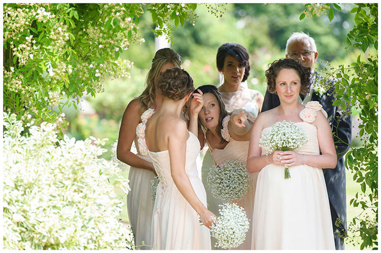 chippenham park summer wedding bridesmaid points the way