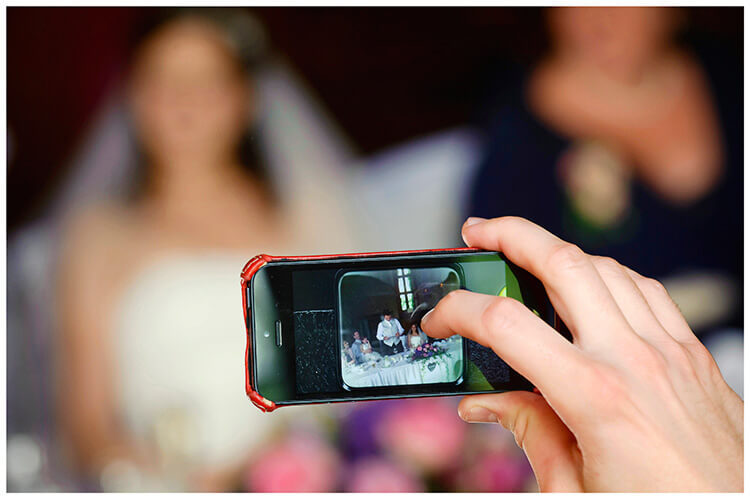 Fanhams Hall wedding phone photo grooms speech