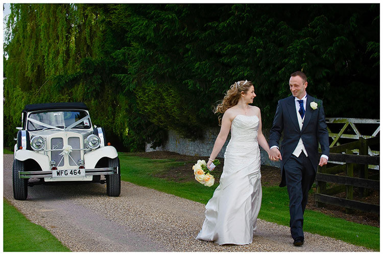 Snelson Farm wedding bride groom walking car