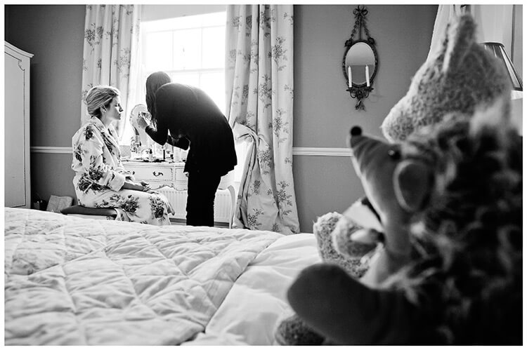 Leicestershire Kirby Muxloe wedding teddy bears on bed watch bride getting ready