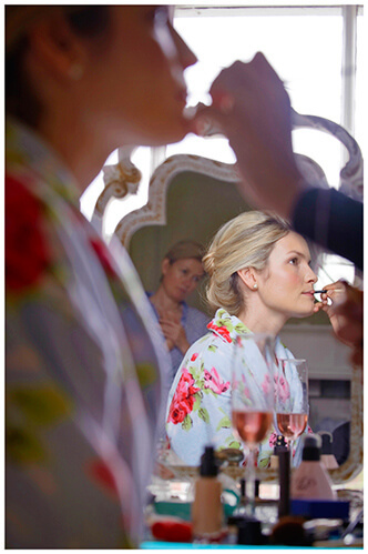 Leicestershire Kirby Muxloe wedding bride getting ready watched by friend in mirror