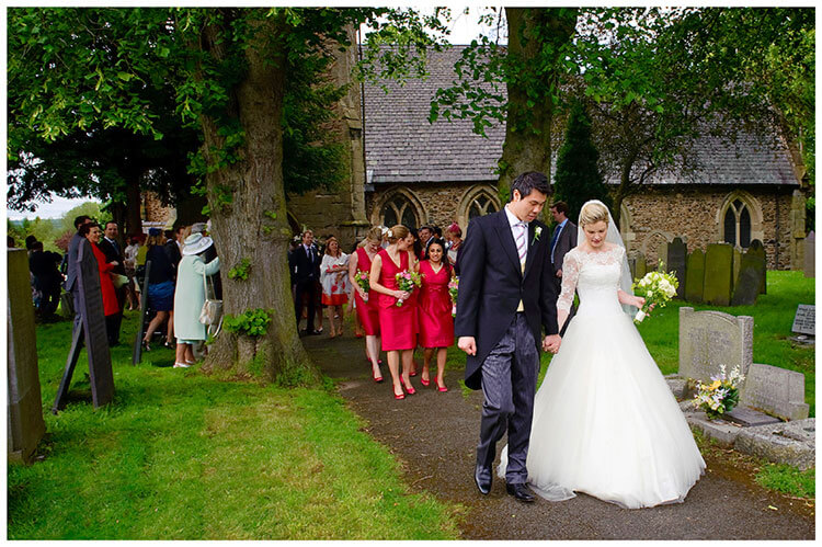 Leicestershire Kirby Muxloe wedding brid egroom lead wedding party away from church