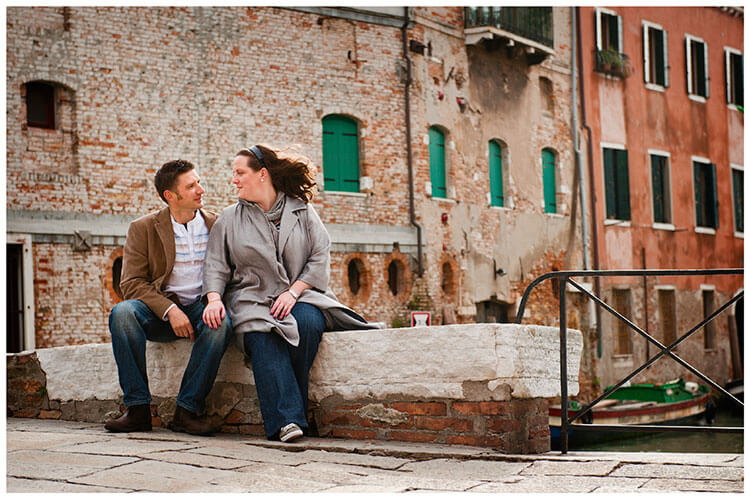 Venice Post Wedding Shoot photography couple sitting on low wall