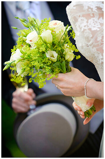 brides bouquet and top hat