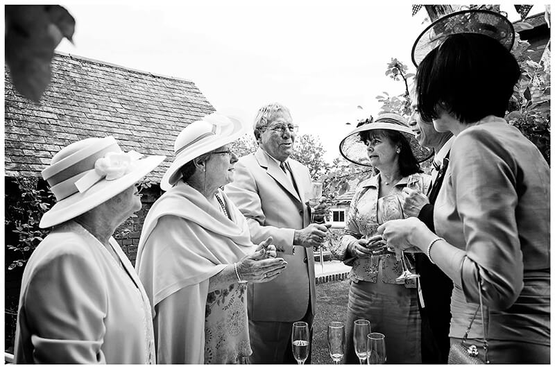 older guests in conversation during a Garden Wedding reception