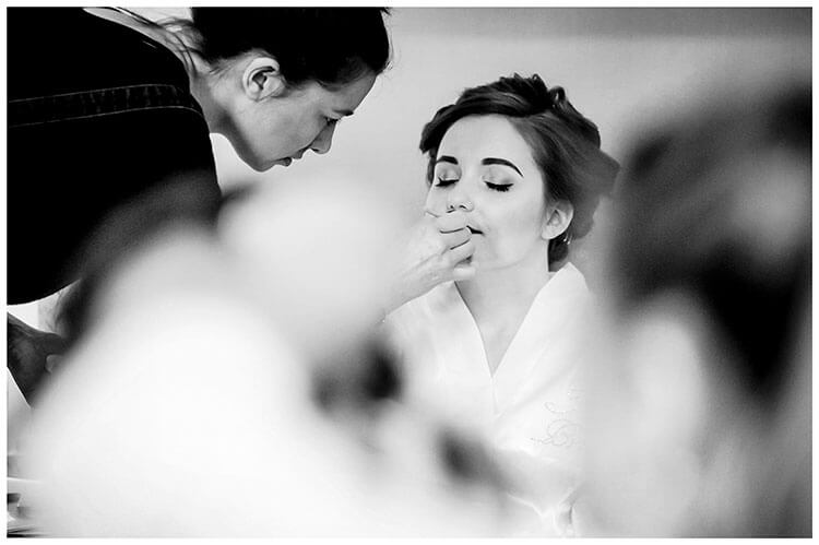 Favourite wedding photography 2018 bride closes eyes as she gets make up done