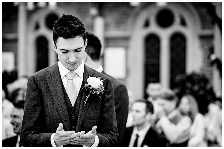 Nervous Groom checks palms prior to wedding ceremony at Kilworth House wedding