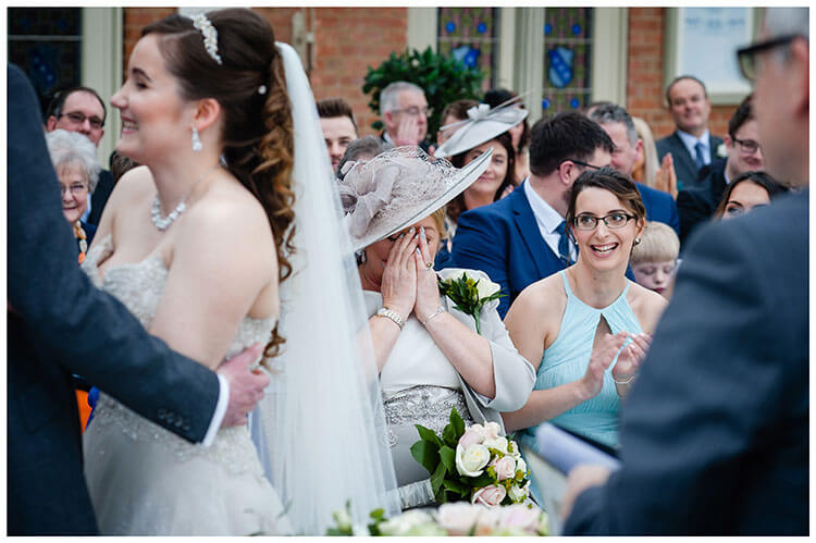 Parent holds back tears during Kilworth House wedding ceremony