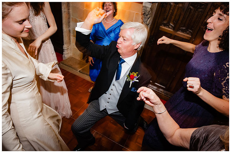 Gent striking a pose whilst dancing with the Bride at Smallfield Place Surrey weddig reception Favourite wedding photography 2018